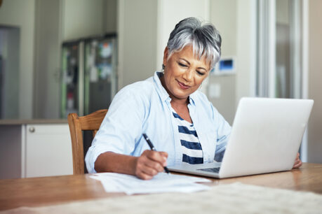 Woman reviewing savings documents