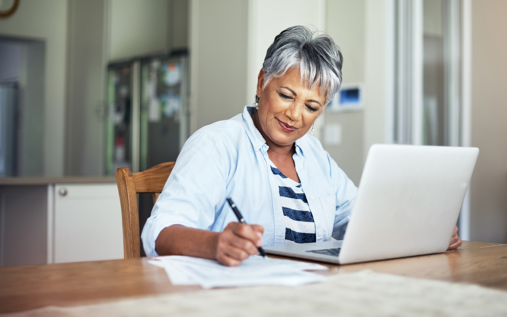 Woman reviewing savings documents