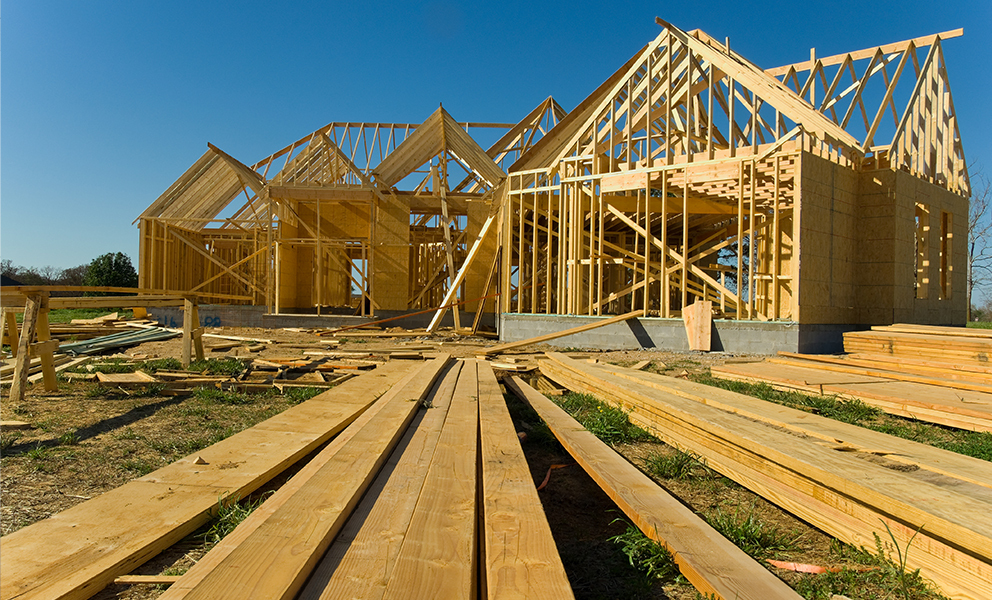 Wooden structure of house being built