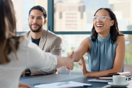 Woman shaking hands with new employer