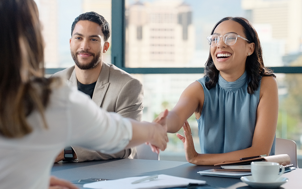 Woman shaking hands with new employer