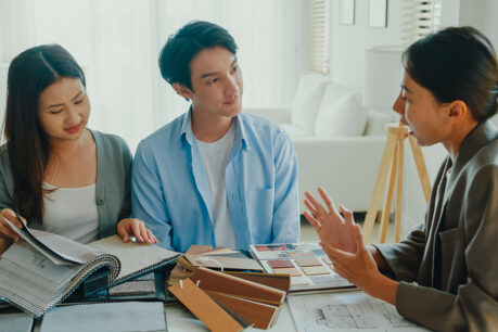 Couple speaking with advisor